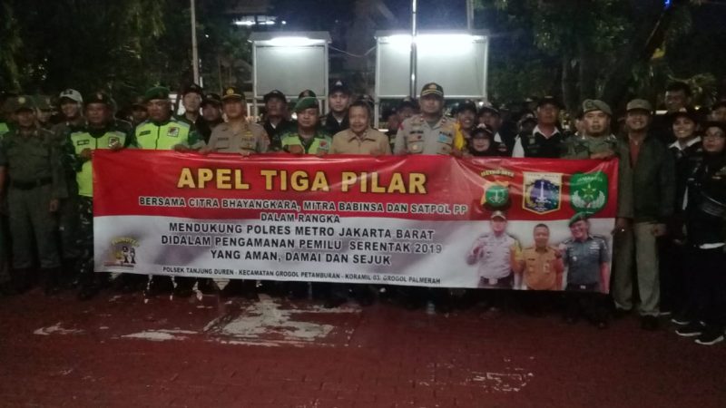Dalam Rangka Menciptakan Pemilu Serentak 2019 yang Aman, Damai dan Sejuk, Pokdarkamtibmas Yaitu Mitra Babinsa dan Citra Bhayangkara Se Kec. Grogol Petamburan, Melaksanakan Apel Bersama Tiga Pilar