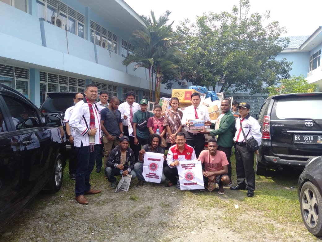 Danlanud Soewondo Fasilitasi Pengangkutan Bantuan Logistik Dari ORMAS  HBB Untuk Korban Bandang Sentani