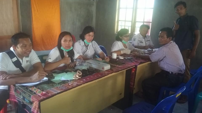 PUSKESMAS HARIAN MELAKSANAKAN POSBINDU PTM DI DESA JANJI MARTAHAN YANG DIDAMPINGI PERSONIL KORAMIL 04 HB