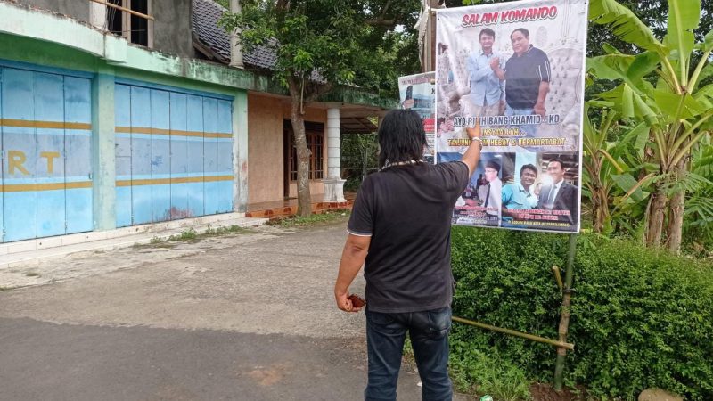 Belum Ada Penetapan, Basuki Geram Calon Kades Catut Foto Tuliskan Satu Komando Didesa Tanjunganom