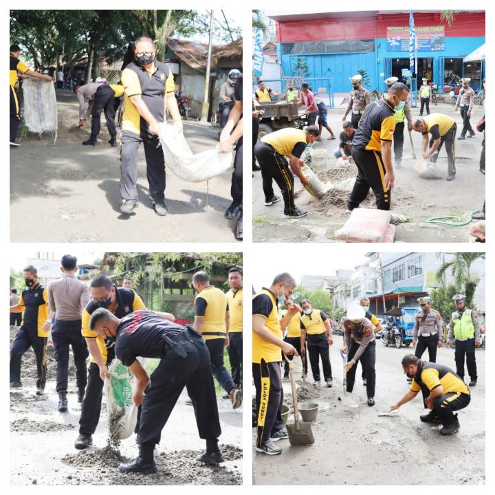 Untuk Mengurangi Kecelakaan Lakalantas, Polres Tanjung Balai Kerja Bakti Jalan Berlobang