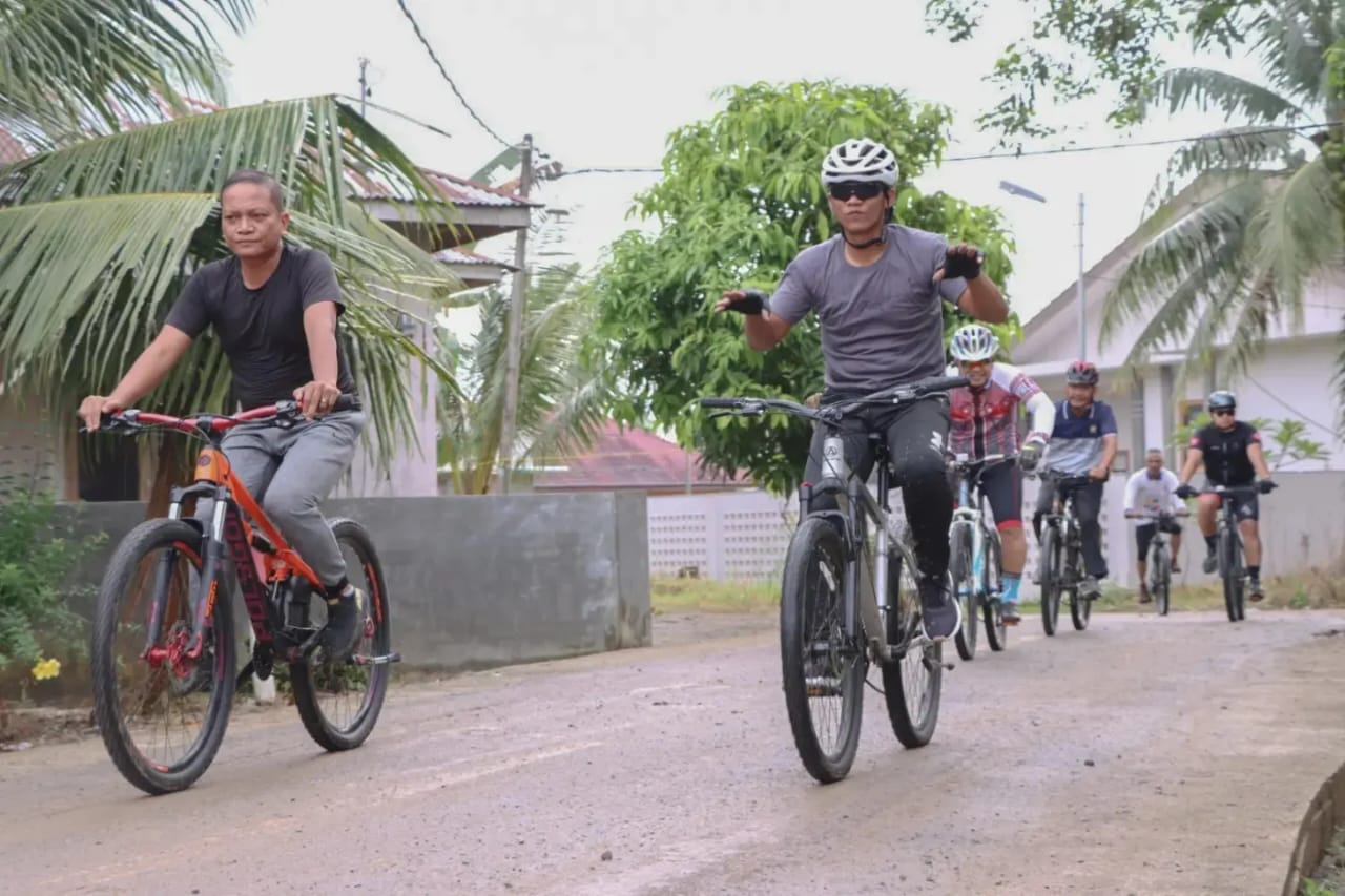 Kapolres Sergai Pantau Kamtibmas di Desa Dengan Naik Sepeda