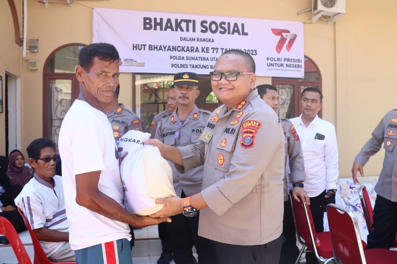Hari Bhayangkara ke-77, Polres Tanjung Balai Laksanakan Bulan Bhakti Polri Presisi 500 Paket Dan Kursi Roda