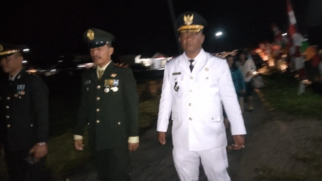 Uspika Dan 14 Kades Se Kecamatan Parmonangan Laksanakan Taptu Dan Pawai Obor