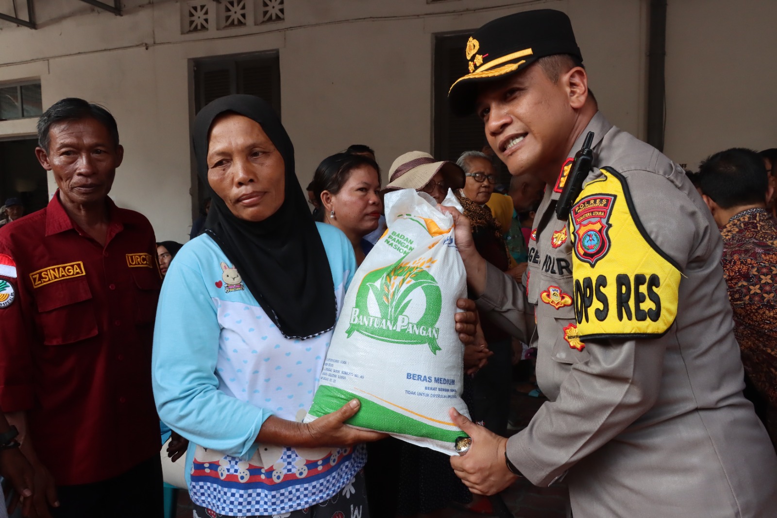 Kapolres Pematangsiantar Hadiri Penyerahan Beras Bapanas Kepada Warga Penerima Manfaat