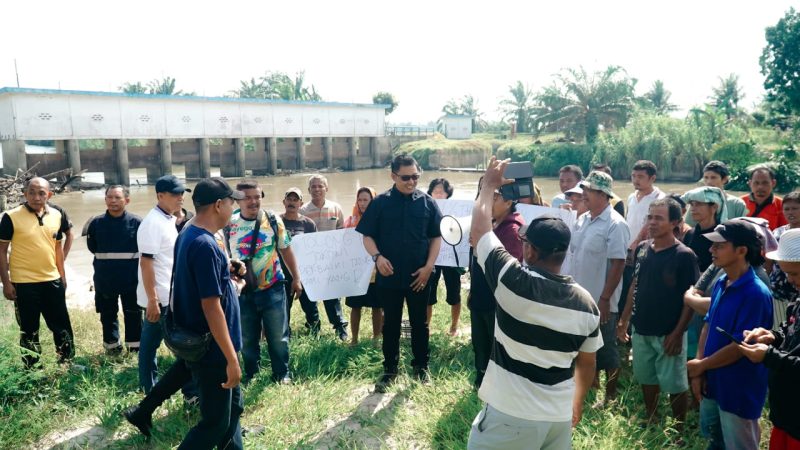 Pj. Bupati Heri Tanggapi Keluhan Petani Terkait Perbaikan Tanggul Sungai Dalu – Dalu