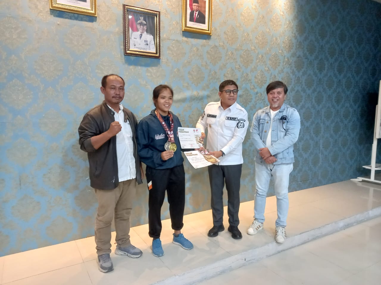 Romauli Putri Desa Lobusunut Raih Medali Emas Di Kejurnas Olahraga Wushu