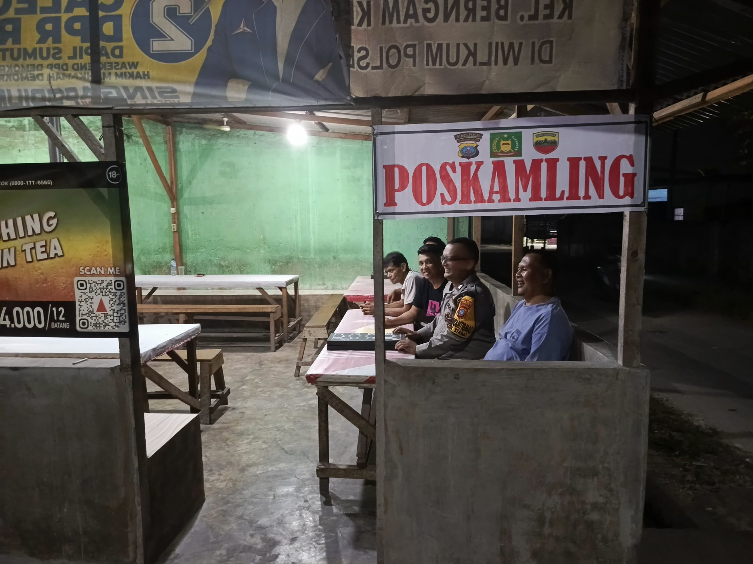 Bhabinkamtibmas Polsek Stabat Sambangi Pos Kamling Pinang Dua Kelurahan Dendang