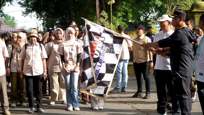 Pemkab Langkat Hadirkan May Day Harmonis, Para Buruh Meriahkan Gerak Jalan di Langkat