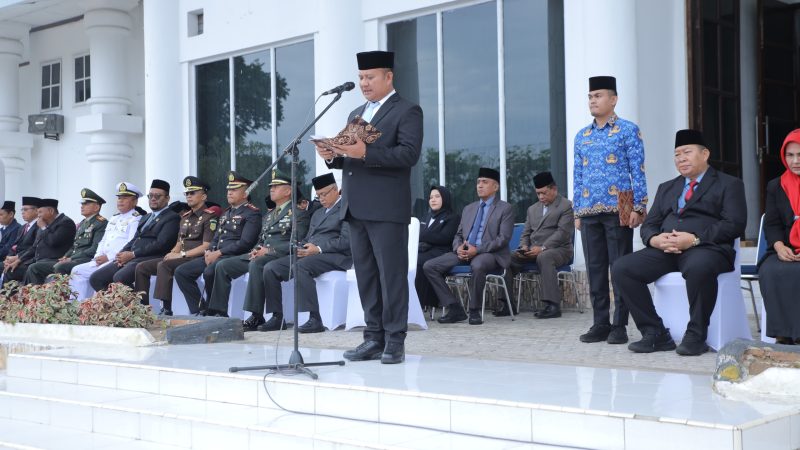Wakil Bupati Asahan Pimpin Upacara HARKITNAS Ke-118, Bacakan Amanat Menteri Komundigi