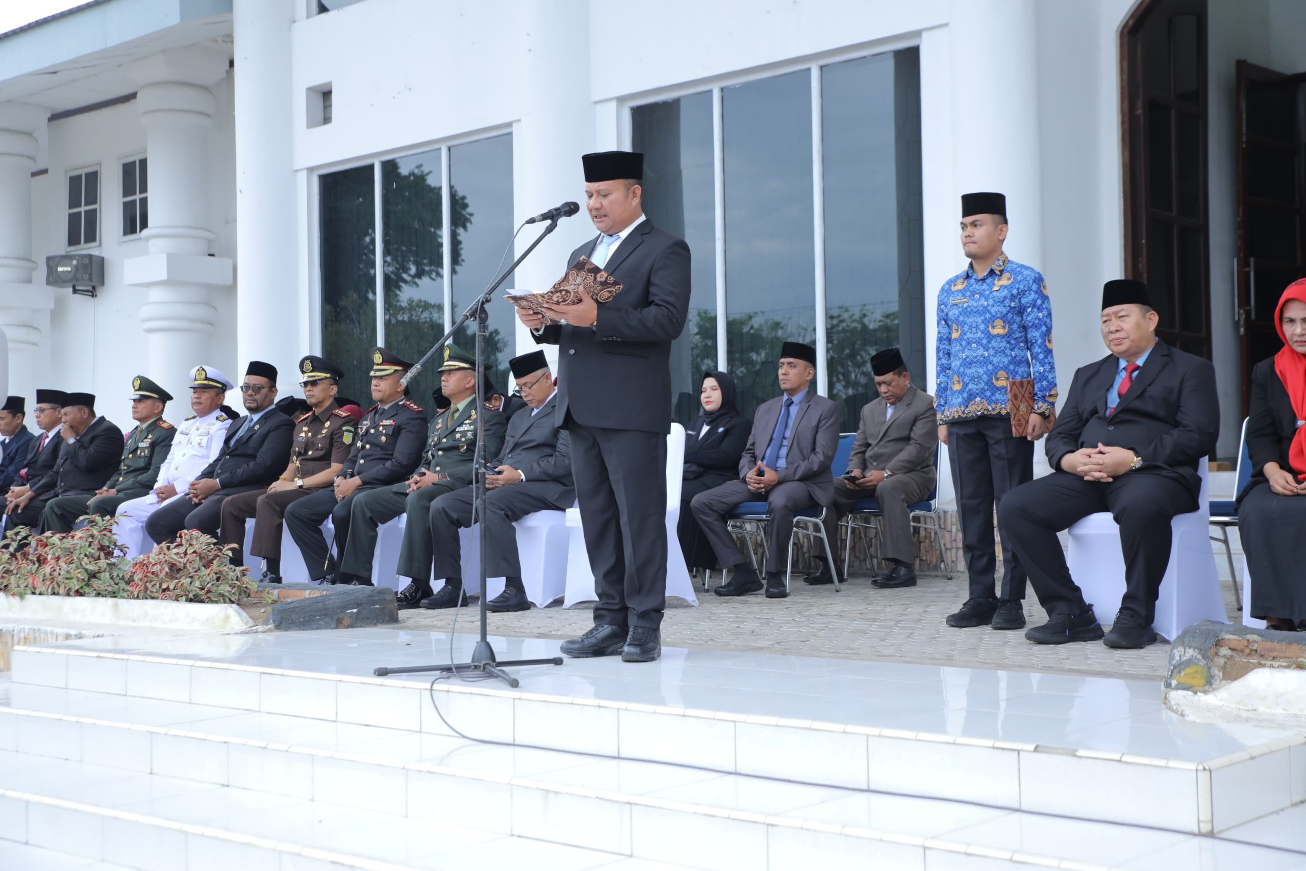 Wakil Bupati Asahan Pimpin Upacara HARKITNAS Ke-118, Bacakan Amanat Menteri Komundigi