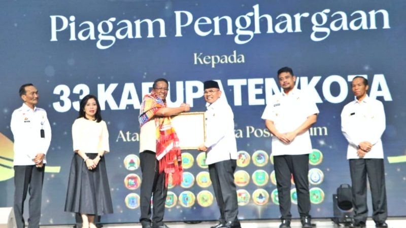 Bupati Simalungun Terima Penghargaan Dari Menhum RI atas Pembentukan 413 Posbankum